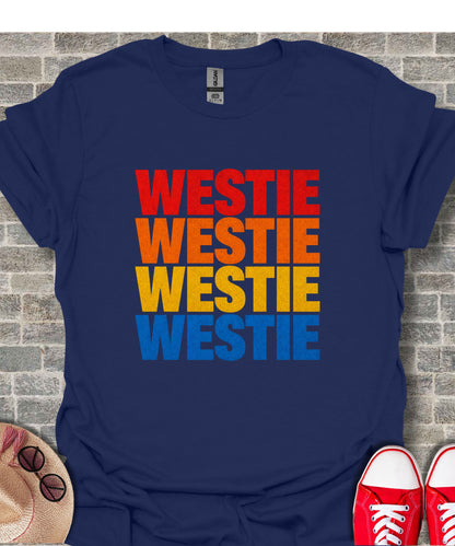 Navy t-shirt with "WESTIE" repeated four times in red, orange, yellow, and blue.