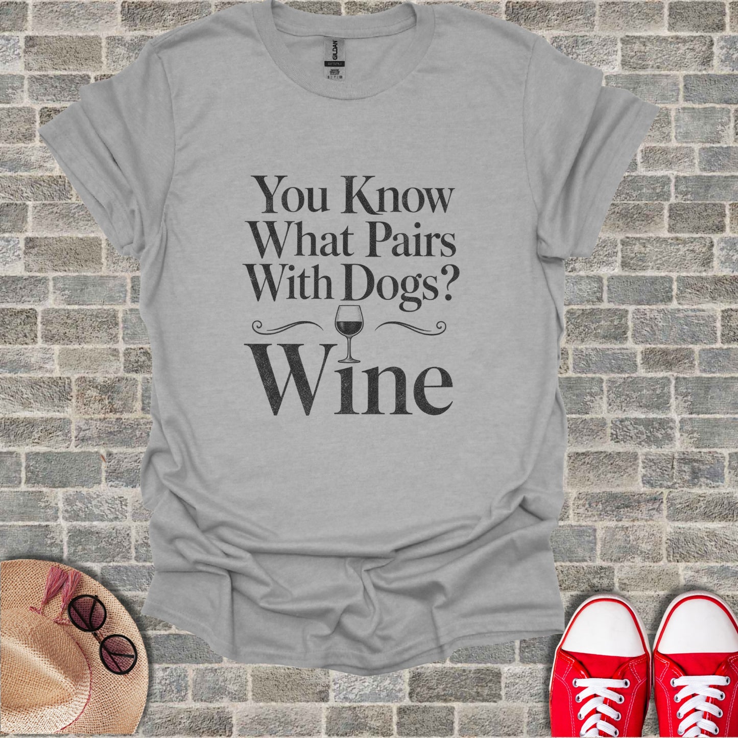 Grey t-shirt with "You Know What Pairs With Dogs? Wine" text and wine glass graphic.