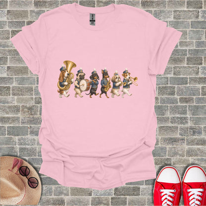 Pink t-shirt with a marching band of dogs playing instruments.