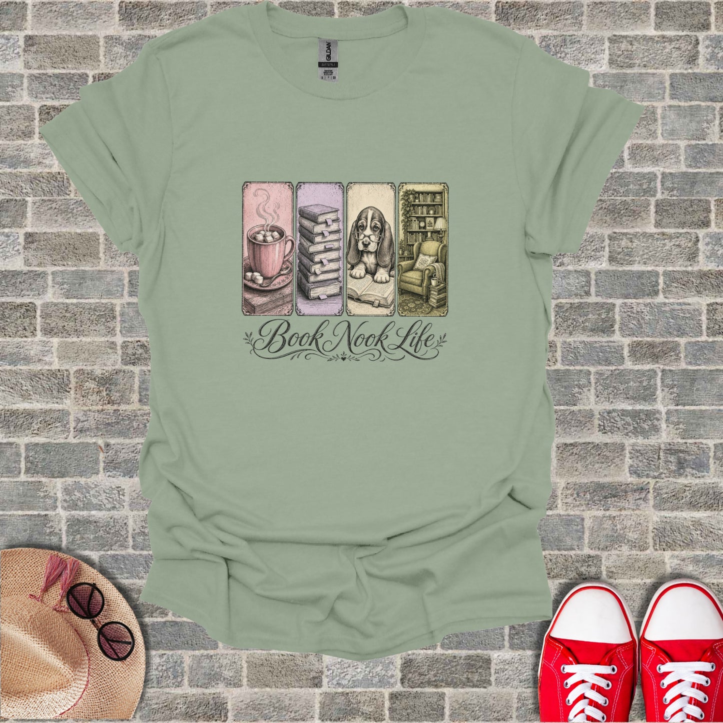 T-shirt with "Book Nook Life" graphic featuring stacked books, hot cocoa, and a dog.