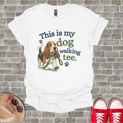 White t-shirt with a Basset Hound graphic and text "This is my dog walking tee."