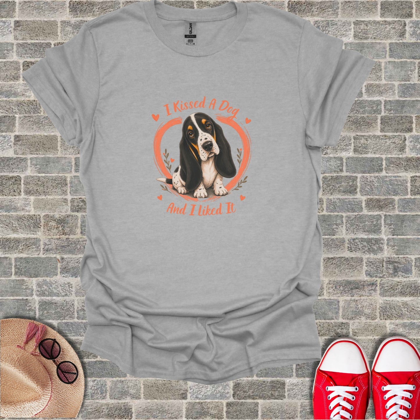 Gray t-shirt with a Basset Hound and text "I KISSED A DOG AND I LIKED IT".