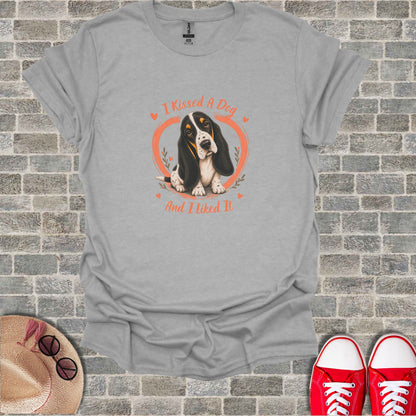 Gray t-shirt with a Basset Hound and text "I KISSED A DOG AND I LIKED IT".