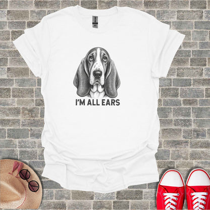 White t-shirt with a sketched basset hound and text "I'M ALL EARS".