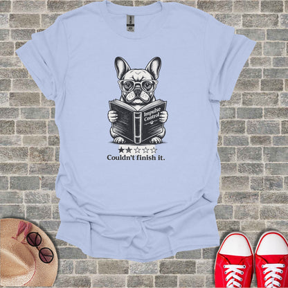 French bulldog wearing glasses reads "Impulse Control" book.