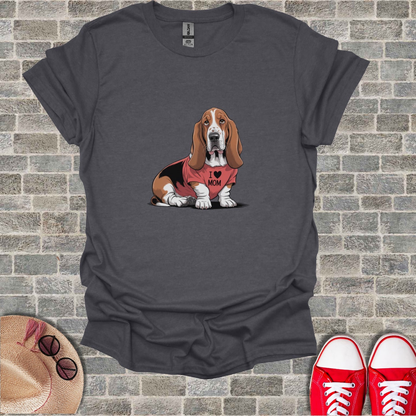 Dark gray t-shirt with a cartoon Basset Hound wearing a pink "I Love Mom" shirt.