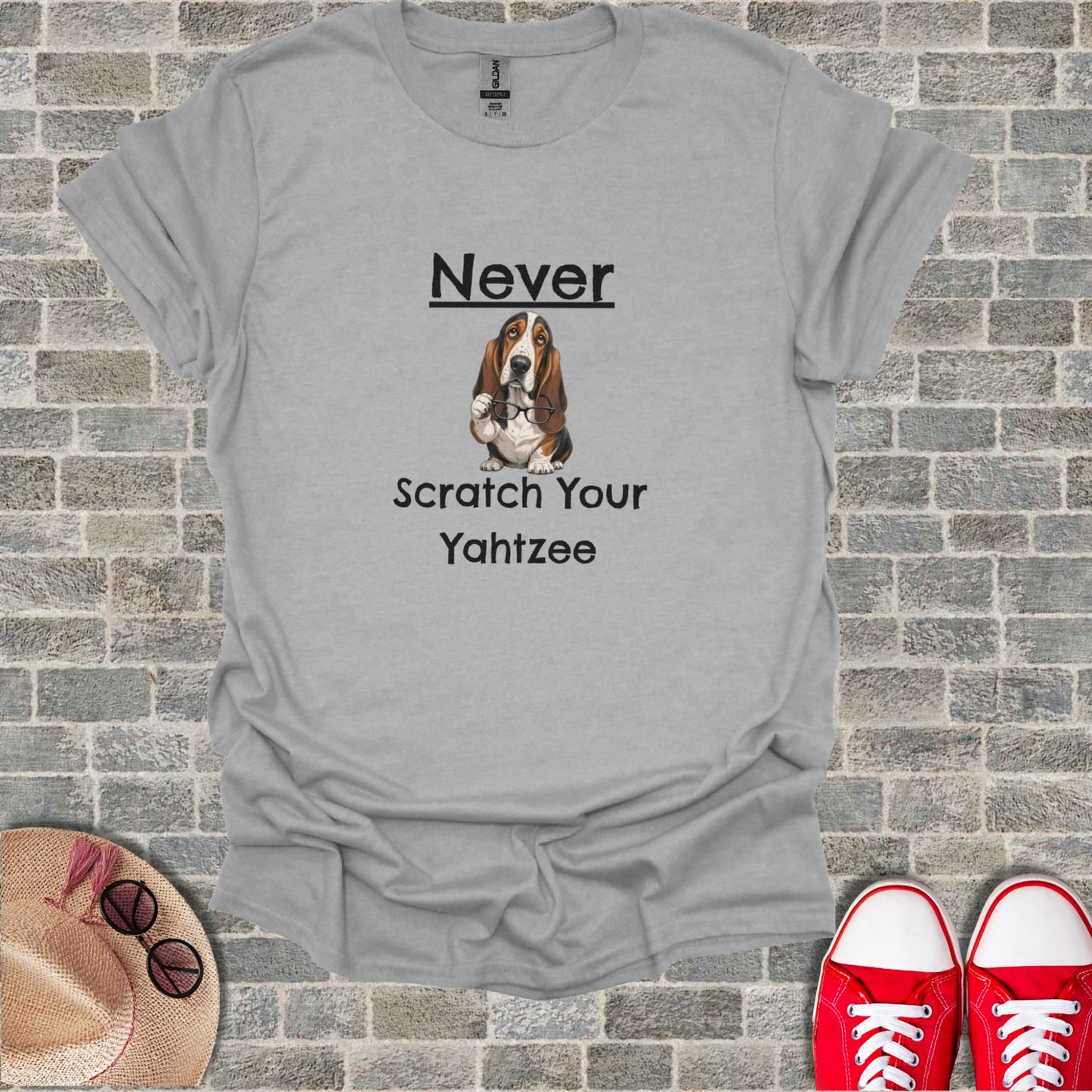 Gray t-shirt with a basset hound and text reading "Never Scratch Your Yahtzee".