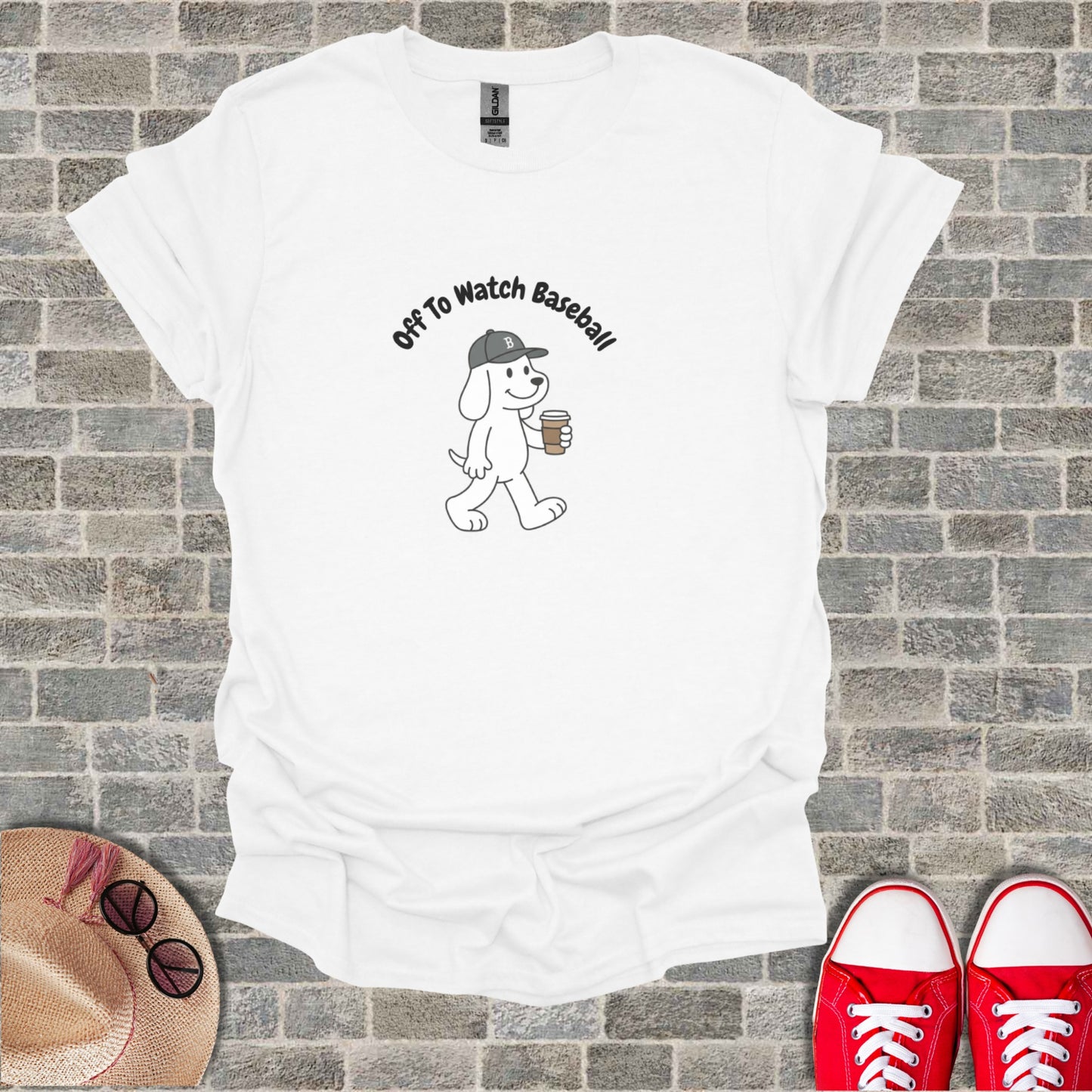 White t-shirt with a cartoon dog wearing a baseball cap and holding a coffee cup.