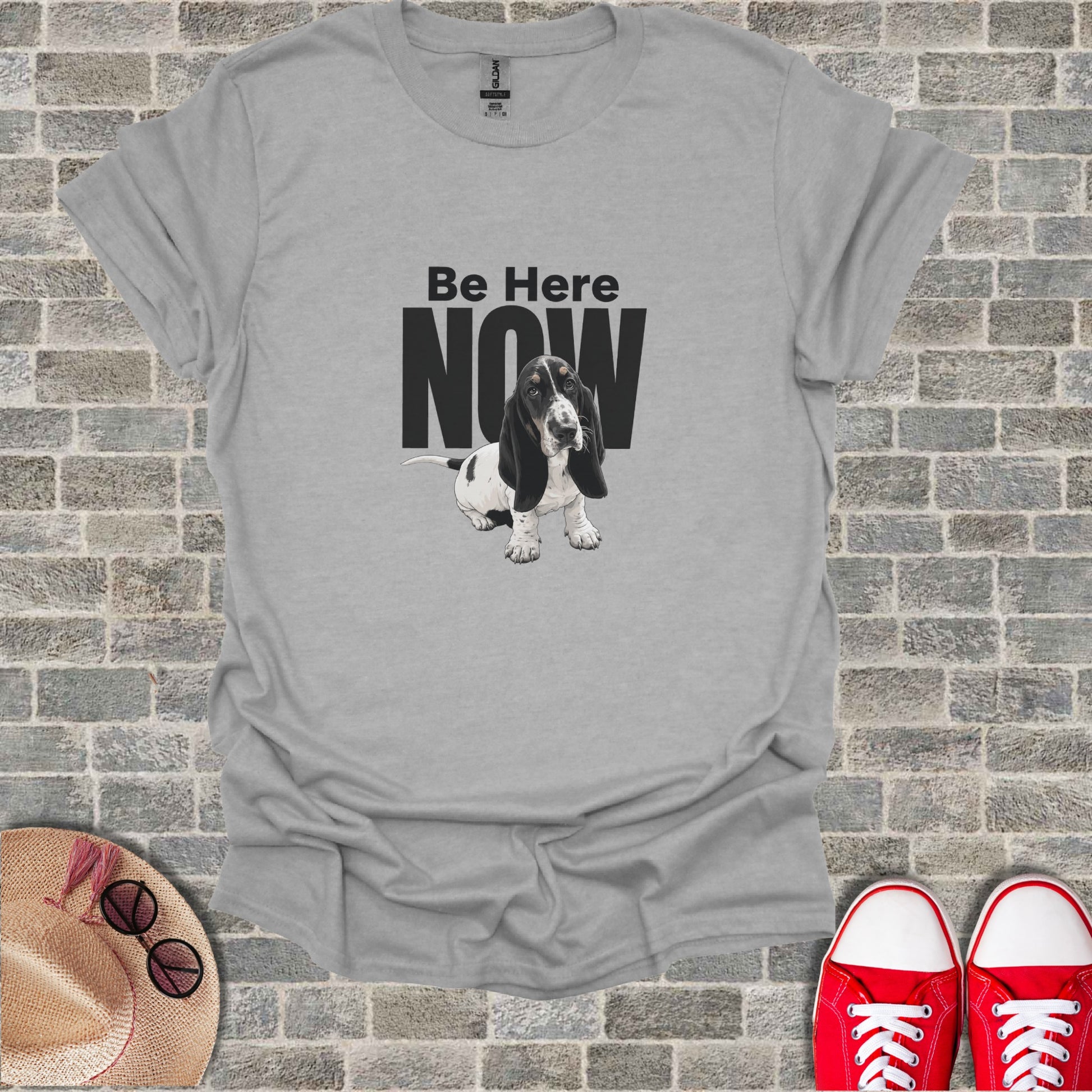 Gray t-shirt with "Be Here NOW" text and Basset Hound dog graphic.