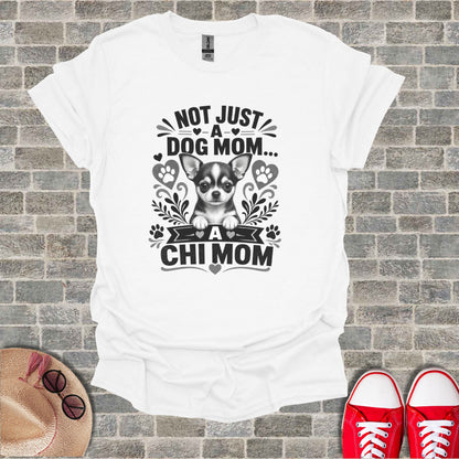 White t-shirt with "Not Just A Dog Mom... A Chi Mom" and a Chihuahua graphic.