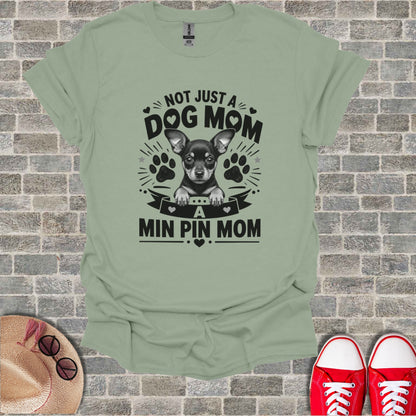 T-shirt with "Not Just A Dog Mom, A Min Pin Mom" text and chihuahua graphic.