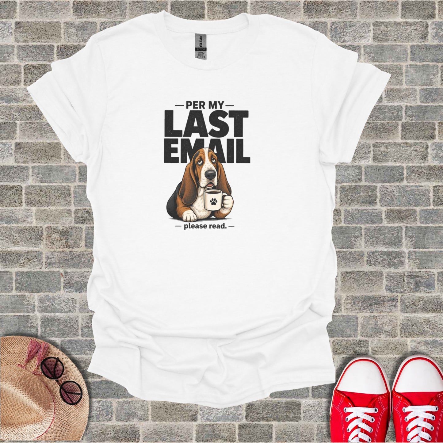 White t-shirt with a basset hound drinking coffee and text "PER MY LAST EMAIL".