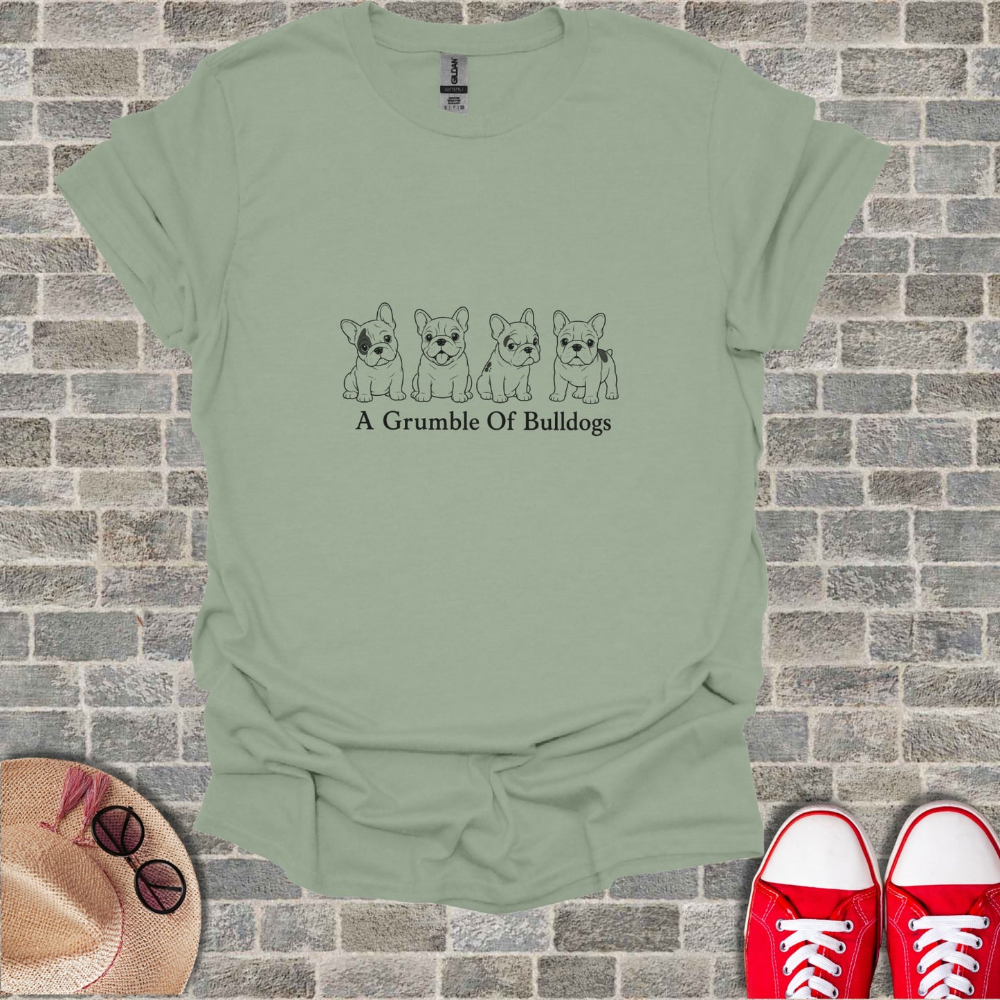 T-shirt with line art of four bulldogs and "A Grumble of Bulldogs" text.