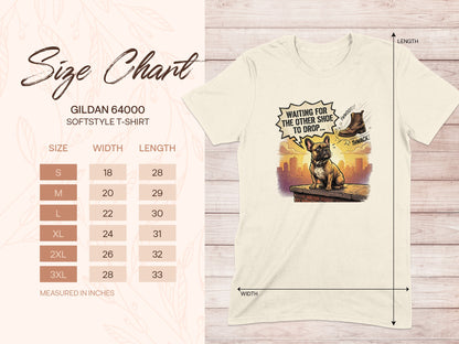 Gildan 64000 size chart for softstyle t-shirt with graphic of dog waiting for shoe.