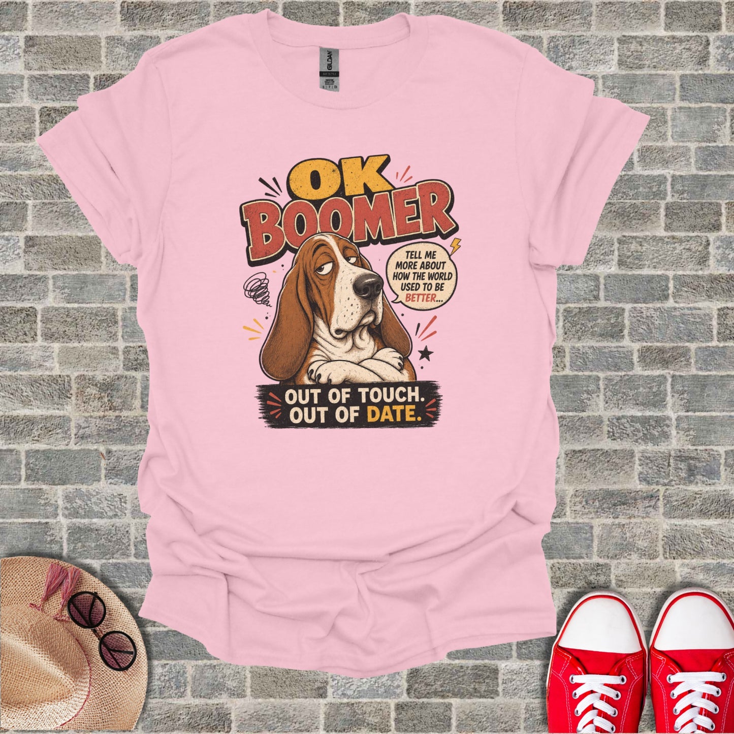 Pink t-shirt with "OK Boomer" text and a sad dog illustration.