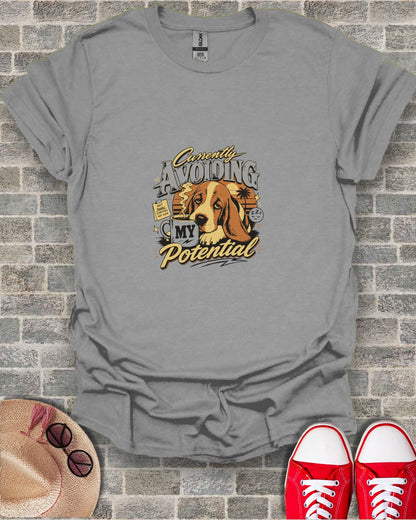 Gray t-shirt with basset hound graphic "Currently Avoiding My Potential".