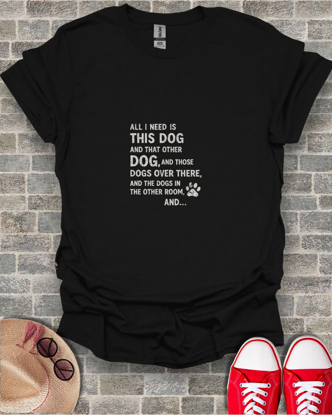 Black t-shirt with white text about dogs, "ALL I NEED IS THIS DOG...".
