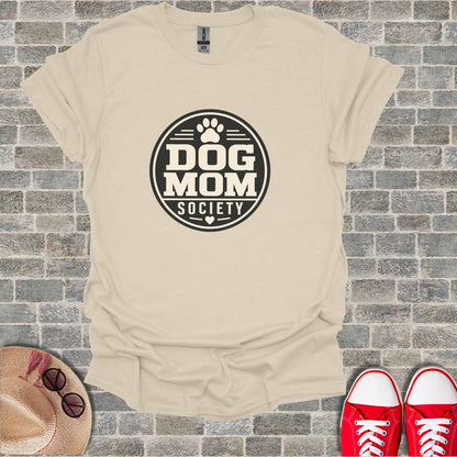 Beige t-shirt with "Dog Mom Society" in a circular logo design.