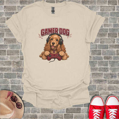 Gamer dog wearing headphones and holding a video game controller.
