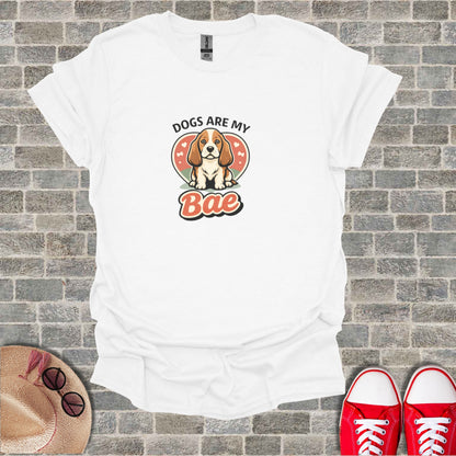 White t-shirt with "Dogs are my Bae" text and dog illustration.