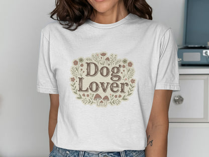 White t-shirt with "Dog Lover" text and floral mushroom border design.