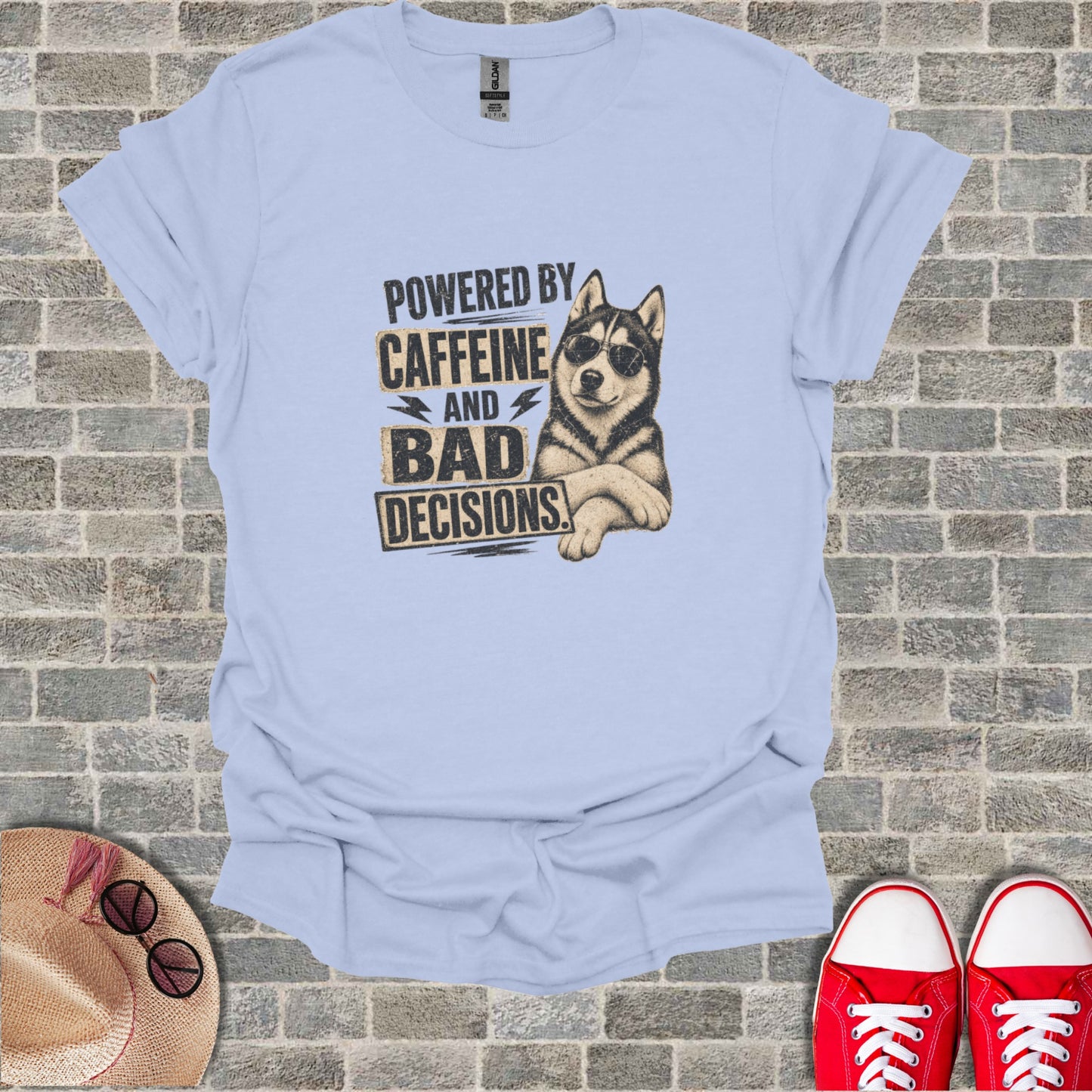 Light blue t-shirt with husky wearing sunglasses, "Powered by caffeine and bad decisions" text.