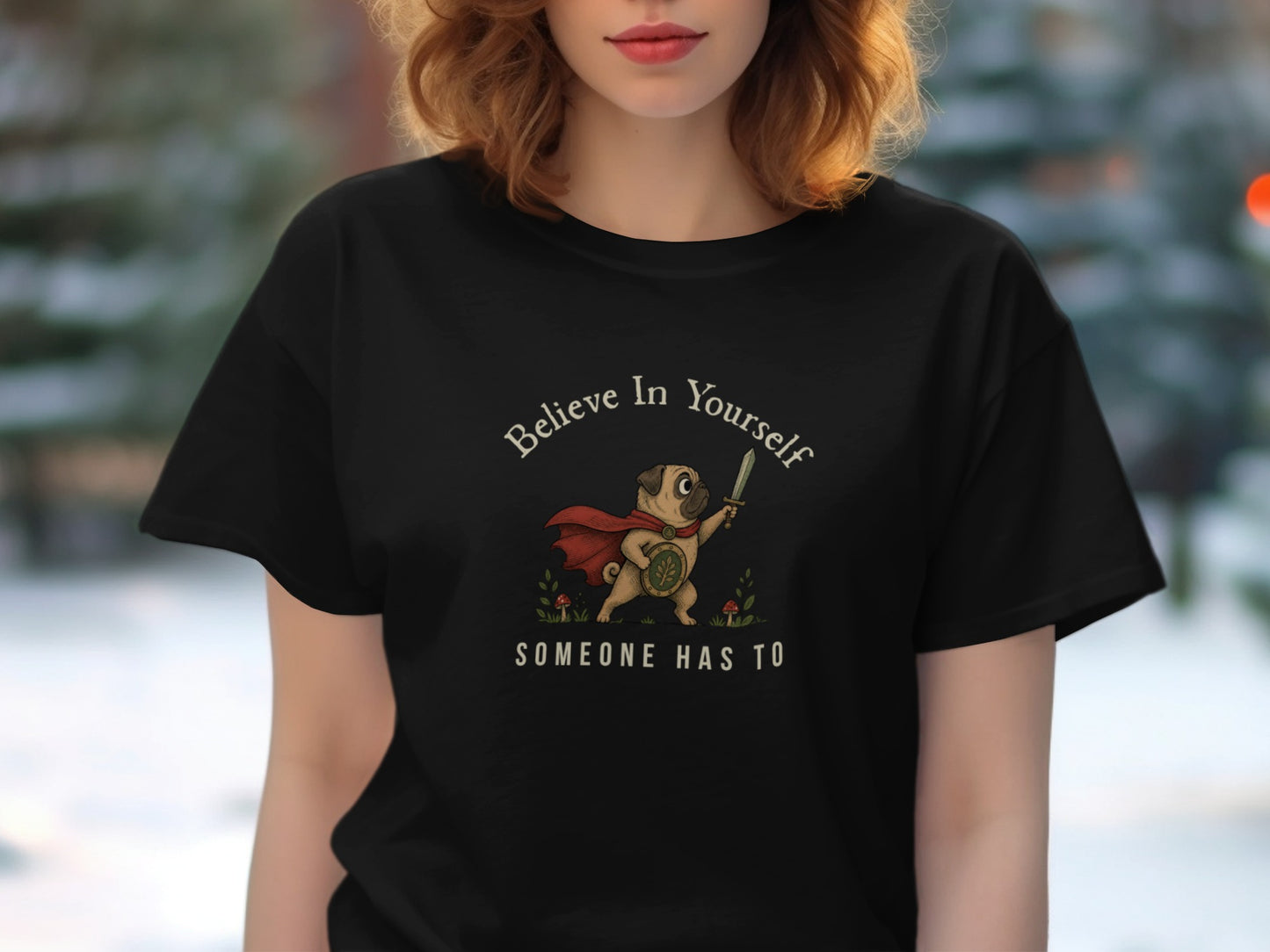 Black t-shirt with pug warrior graphic and text "Believe In Yourself Someone Has To".