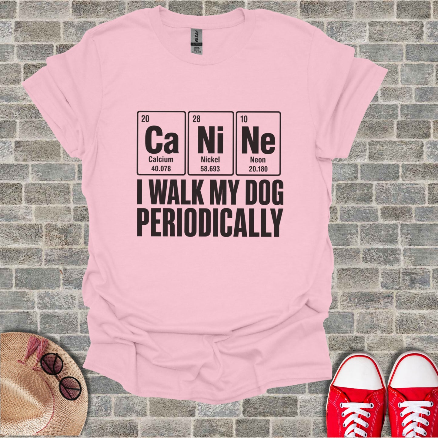 Pink t-shirt with periodic table elements spelling "Ca Ni Ne" (Canine) and "I WALK MY DOG PERIODICALLY".