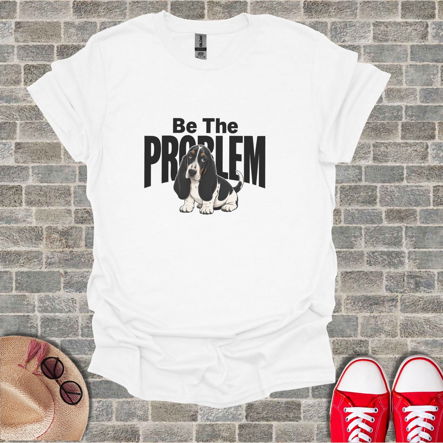 White t-shirt with "Be The Problem" and a Basset Hound graphic.