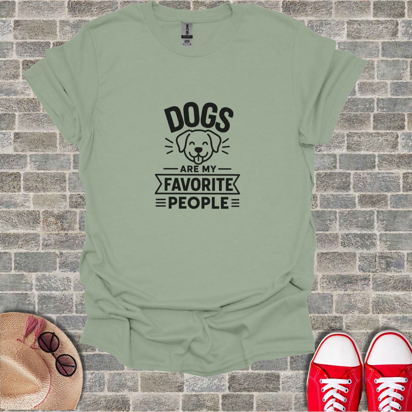 T-shirt with text "Dogs are my favorite people" and dog illustration.