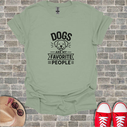 T-shirt with text "Dogs are my favorite people" and dog illustration.