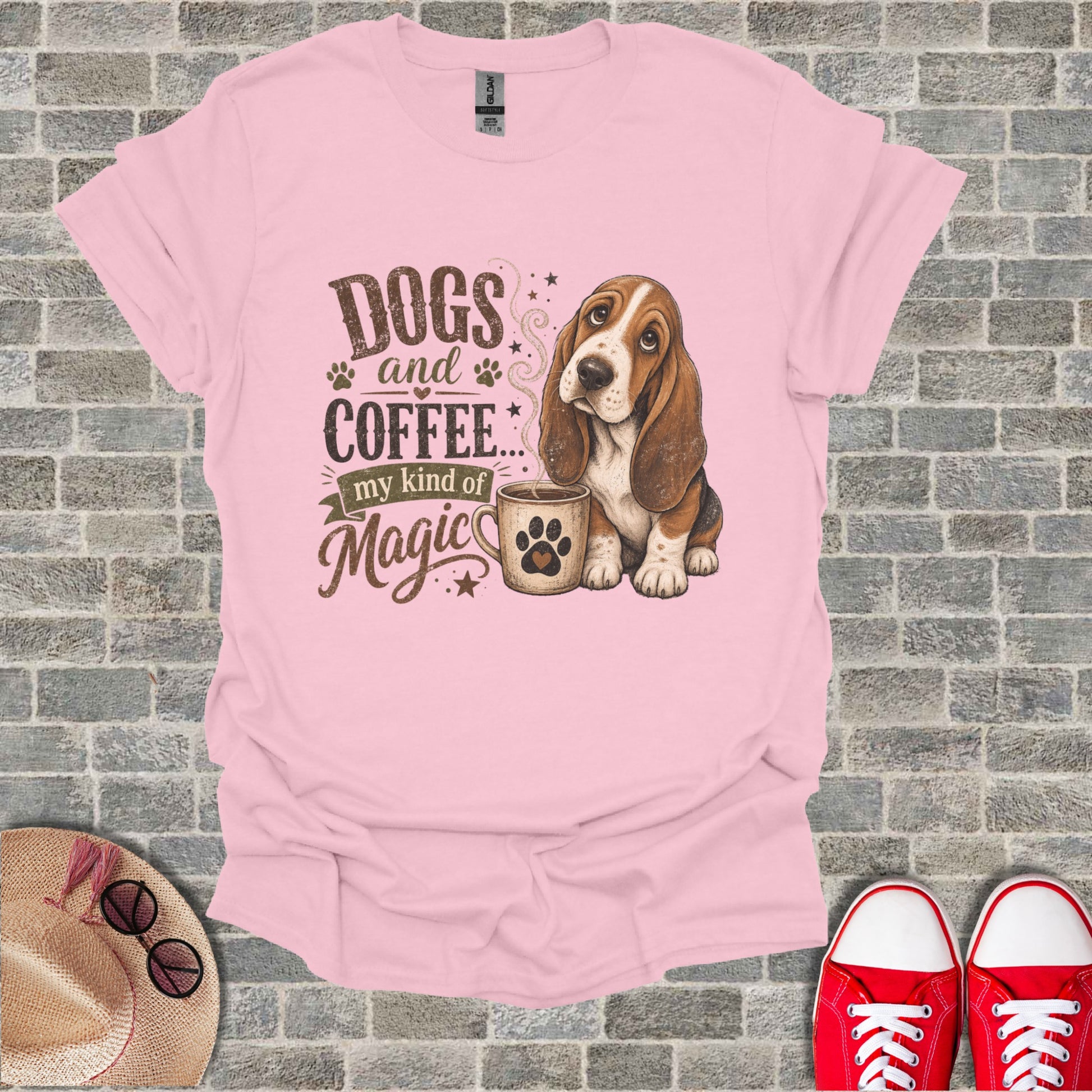 Pink t-shirt with "Dogs and Coffee my kind of Magic" and a Basset Hound.