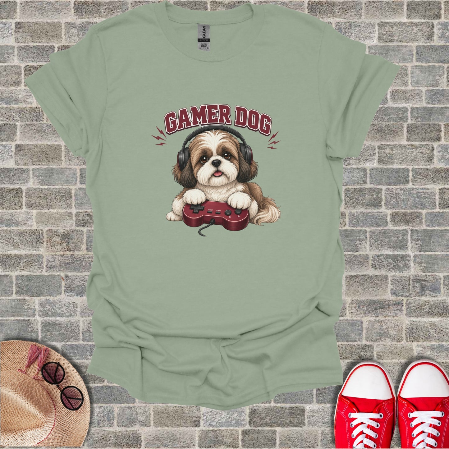 Dog wearing headphones and holding a video game controller.