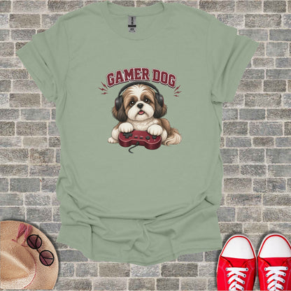 Dog wearing headphones and holding a video game controller.