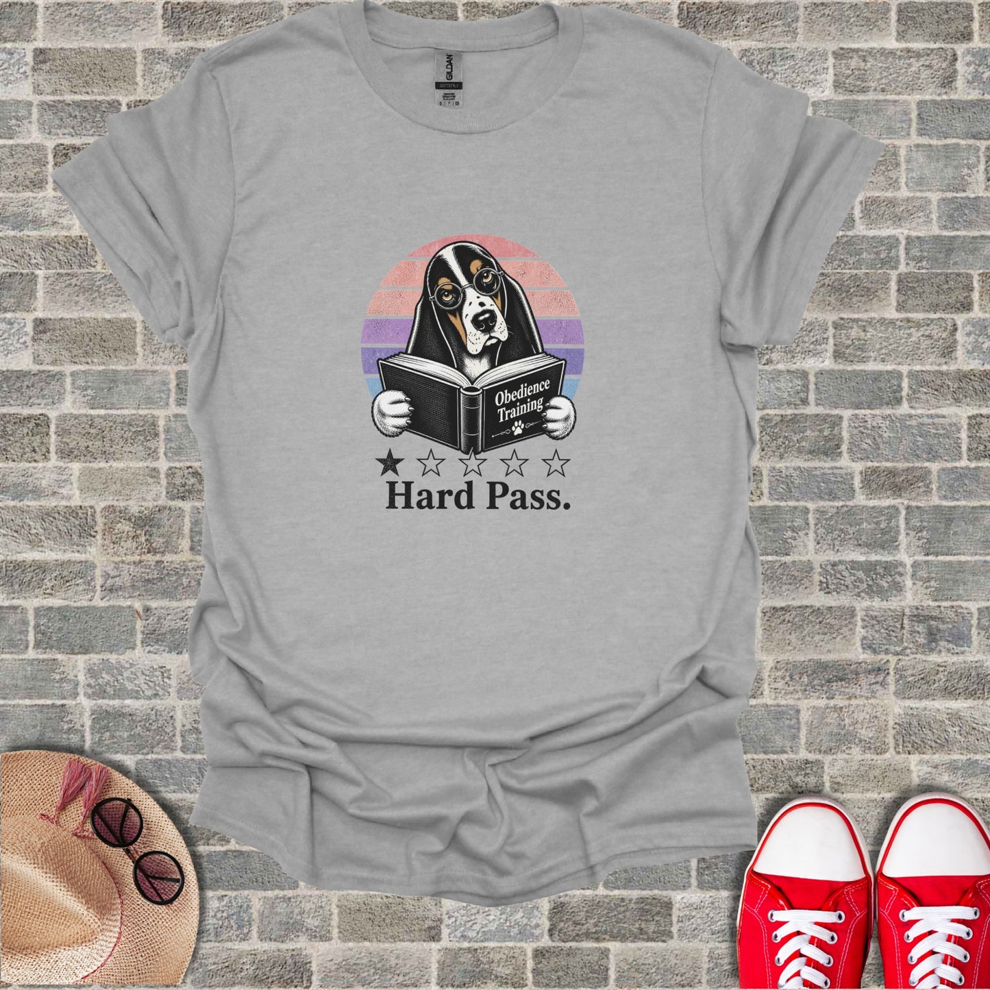 Dog wearing glasses reading a book with "Hard Pass" text.