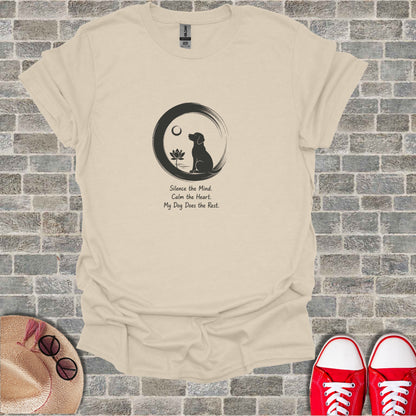 Cream t-shirt with black graphic of dog in circle and inspirational text.