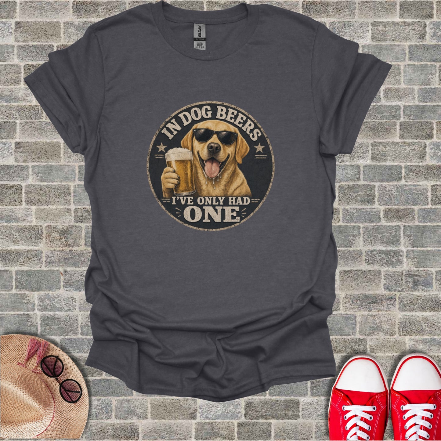 Dark gray t-shirt with a dog wearing sunglasses holding a beer and text.