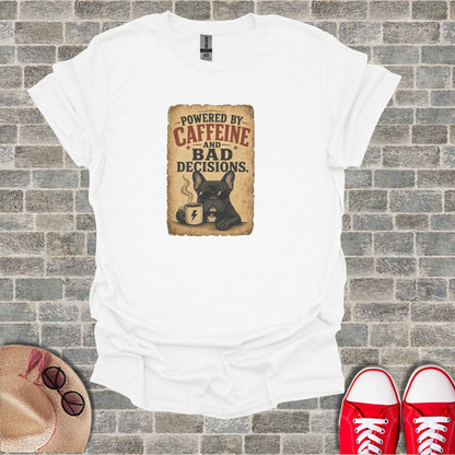 White t-shirt with graphic featuring a French bulldog and text "Powered by Caffeine and Bad Decisions."