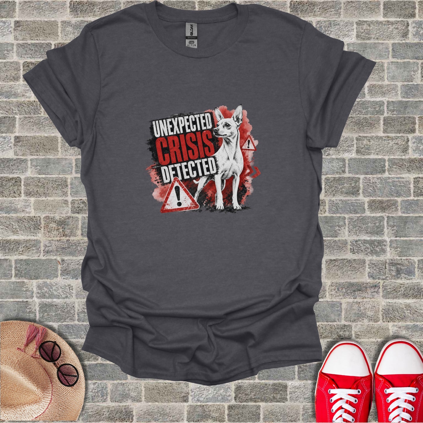 Chihuahua wearing a collar and shirt, with "UNEXPECTED CRISIS DETECTED" text.
