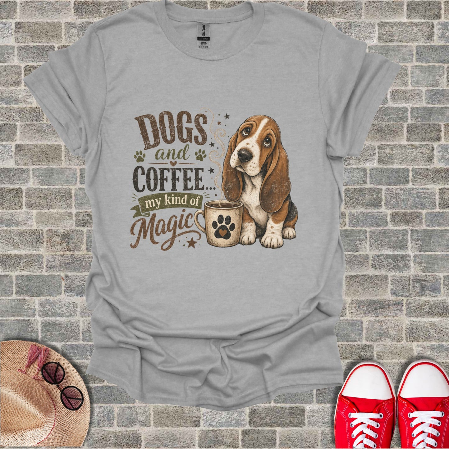 T-shirt with a Basset Hound and coffee cup, text reads "Dogs and Coffee... my kind of Magic".