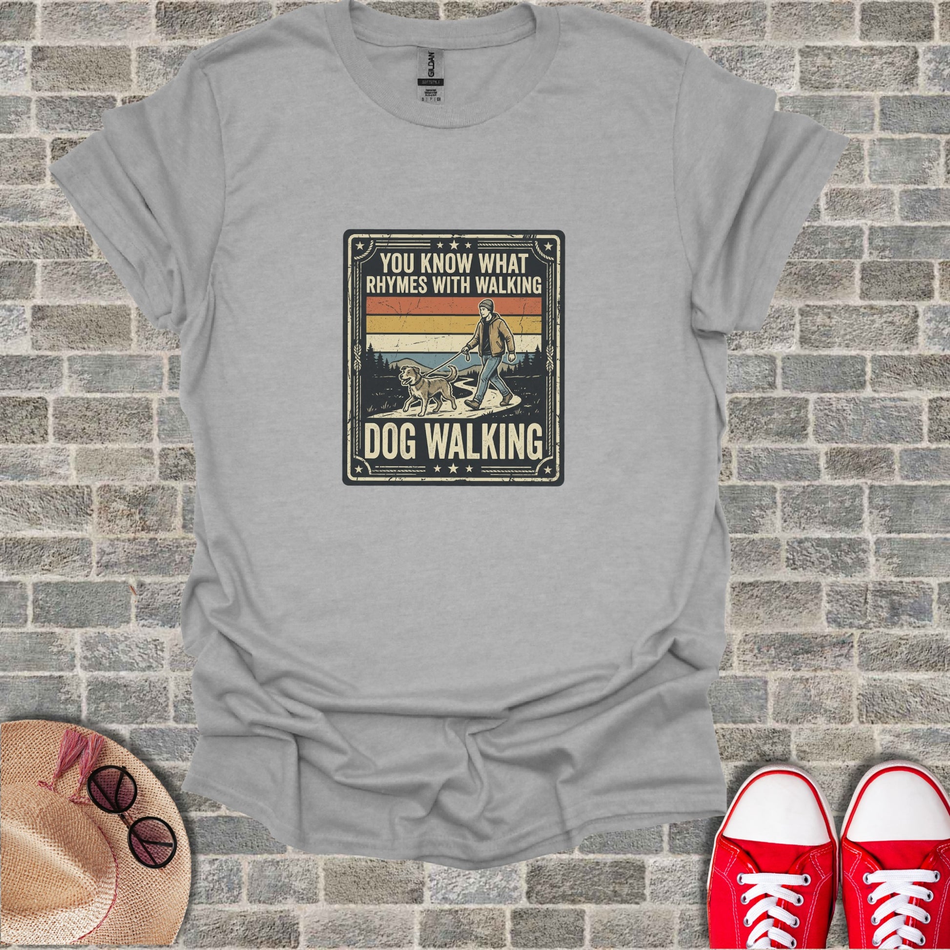 T-shirt with "You know what rhymes with walking? Dog walking" text and graphic.