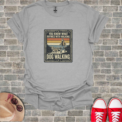 T-shirt with "You know what rhymes with walking? Dog walking" text and graphic.