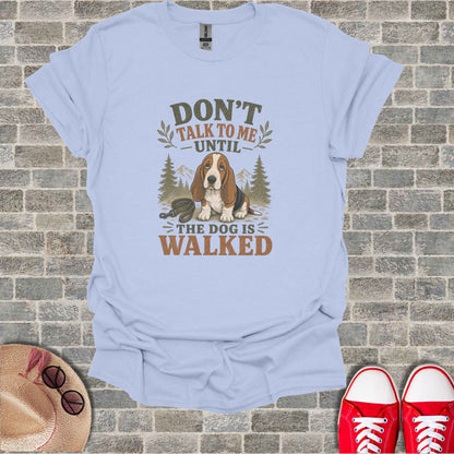 T-shirt with text "DON'T TALK TO ME UNTIL THE DOG IS WALKED" and a basset hound.