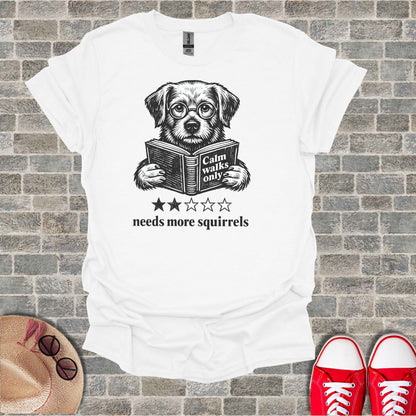 T-shirt with dog reading book, "Calm walks only, needs more squirrels".