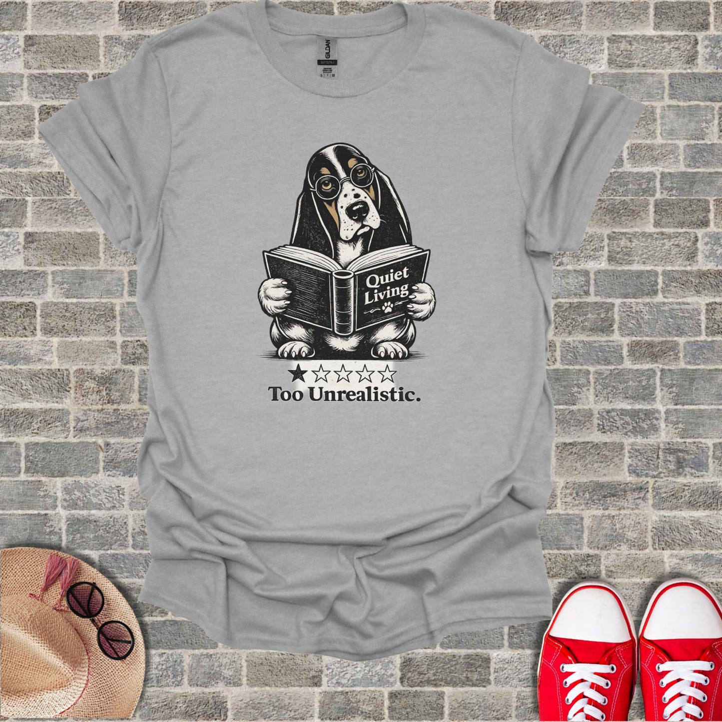 Basset hound wearing glasses reads book labeled "Quiet Living Too Unrealistic."