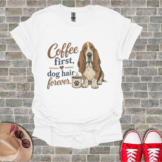 White t-shirt with Basset Hound and "Coffee first, dog hair forever." text.
