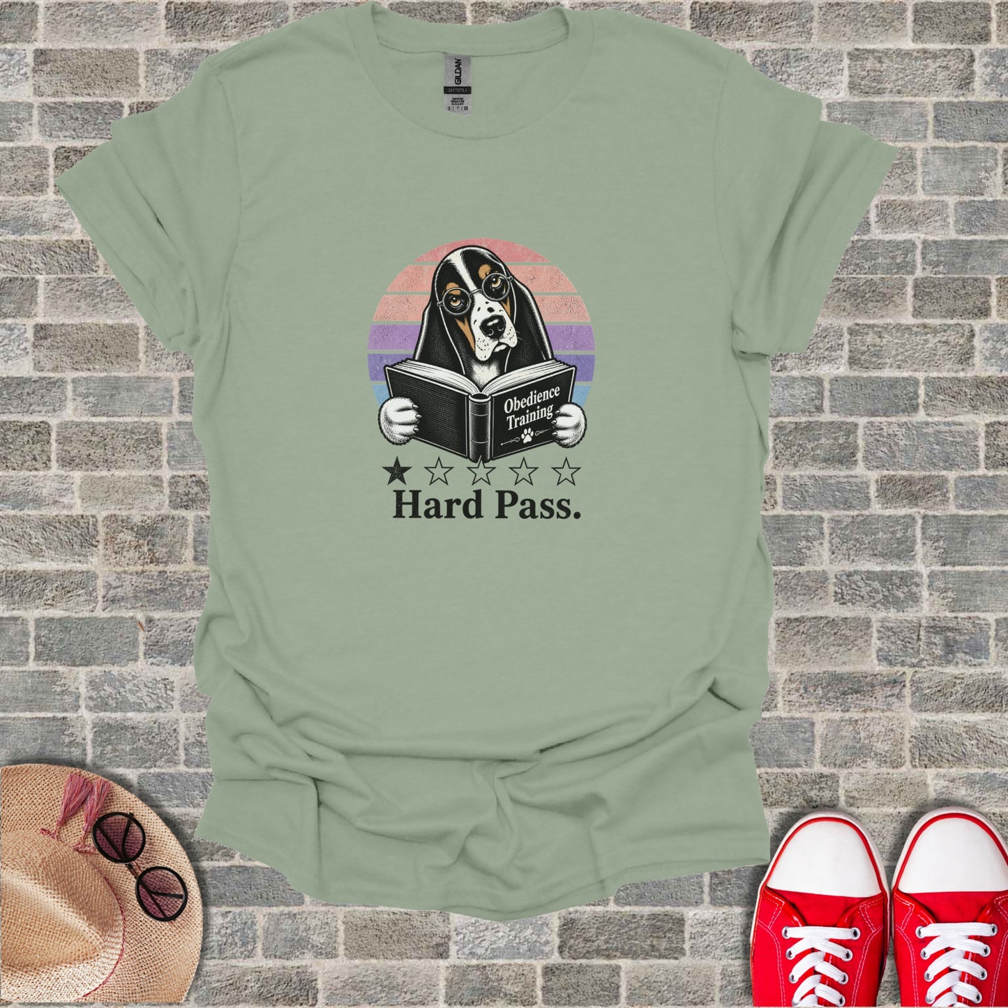 T-shirt with a Basset Hound wearing glasses reading a book titled "Obedience Training: Hard Pass."
