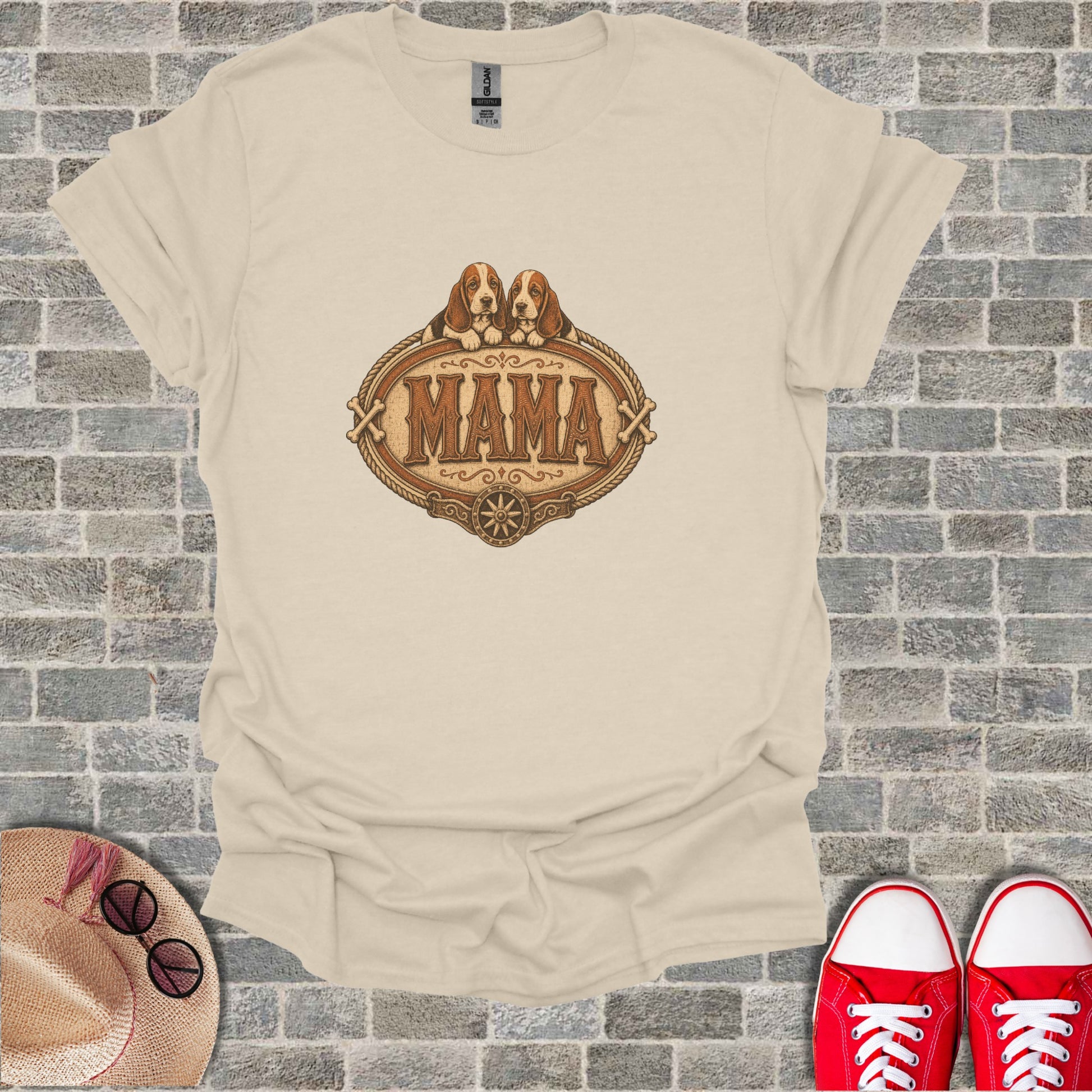 Cream t-shirt with "Mama" in a decorative emblem above two basset hounds.