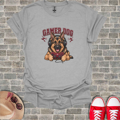 German Shepherd wearing headphones and holding a video game controller.