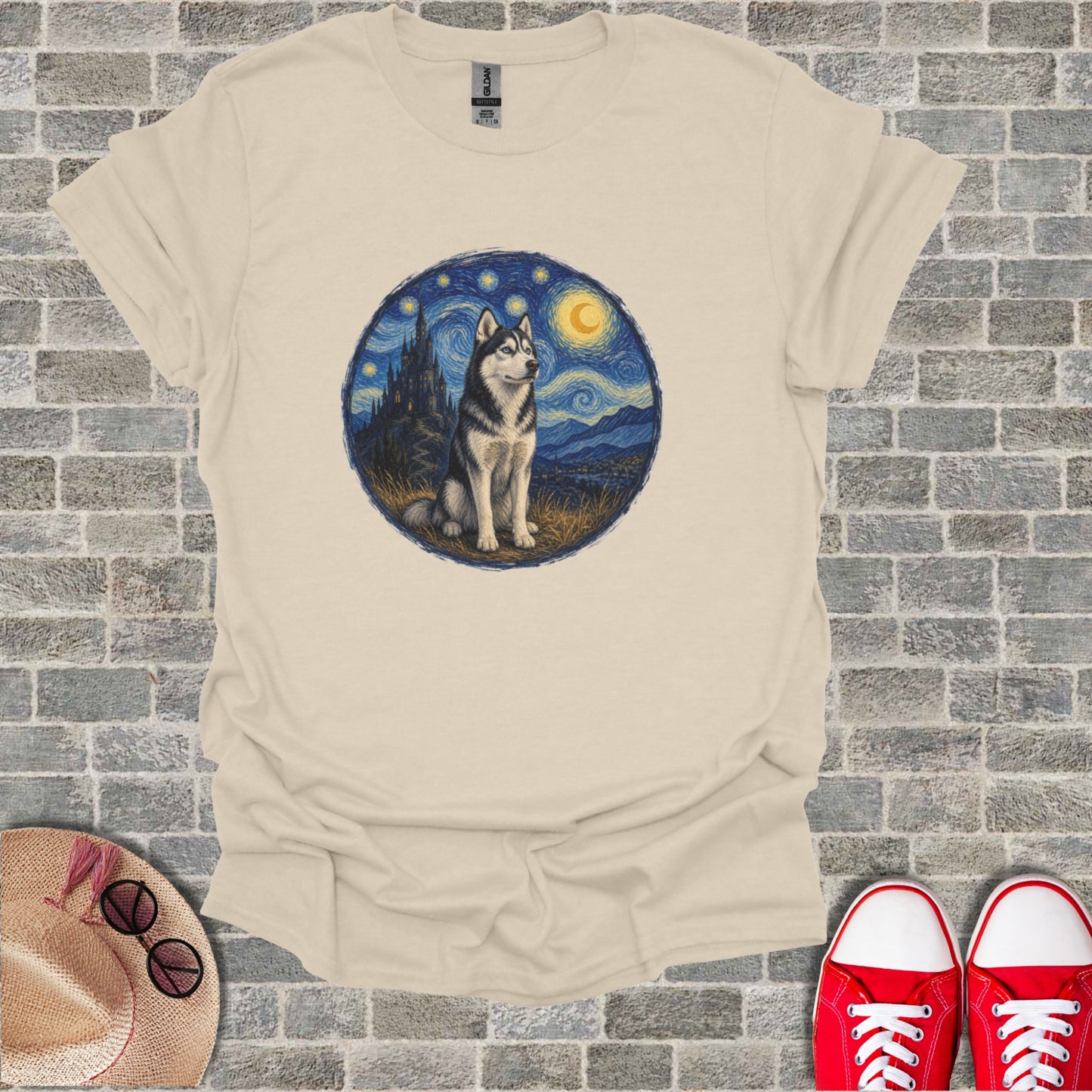 Husky dog under a starry Van Gogh-style night sky on a light tan t-shirt.